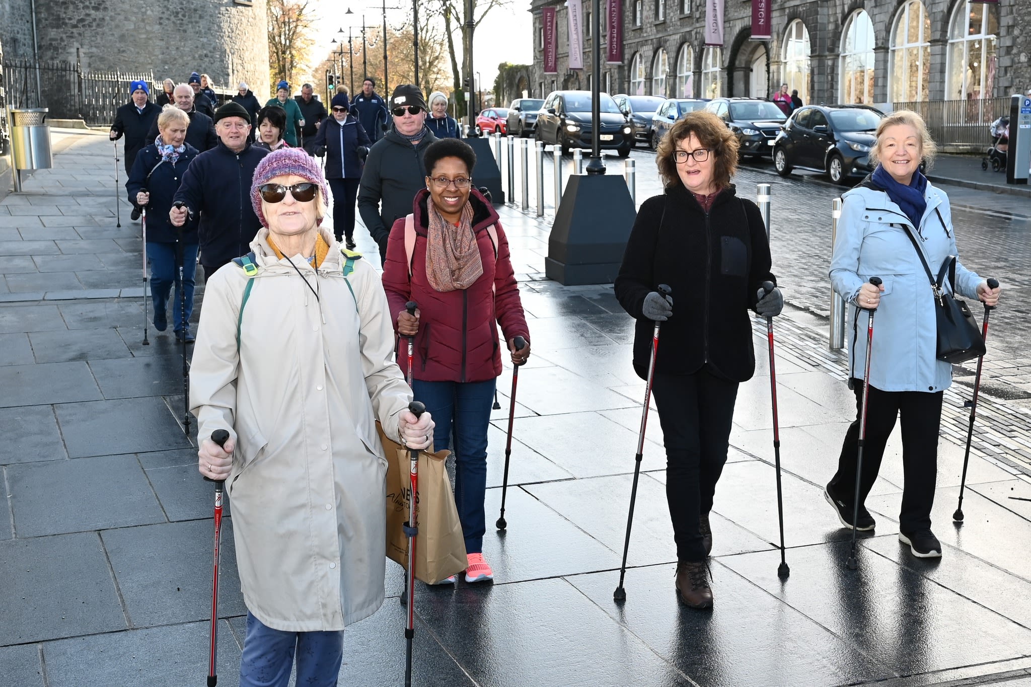 A group of people using Activator Poles for balance 